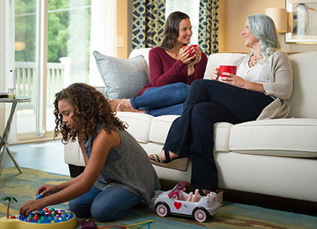 FairPrice_450x325 lifestyle image of family in living room